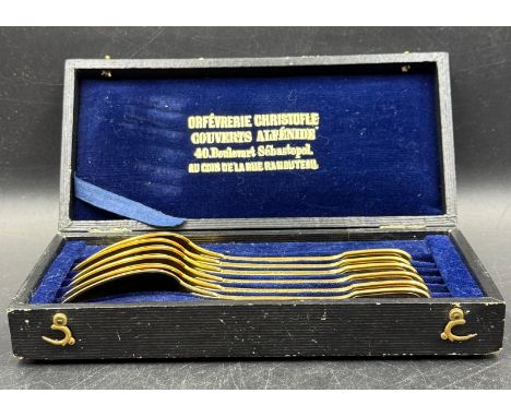 A Boxed set of Christofle Alfenide gold plated spoons.