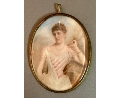 A 19th Century watercolour miniature portrait of a lady in a brass frame 