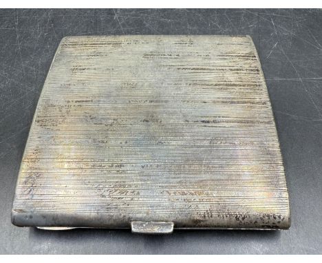 A silver cigarette case by William Neale & Son Ltd, hallmarked for Birmingham 1927
