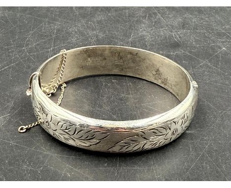 A silver hallmarked bangle approx. total weight 27g