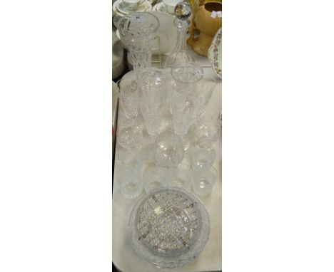 A set of six Waterford Crystal champagne glasses, acid etched marks; a pair of crystal brandy balloons; a cut glass globular 