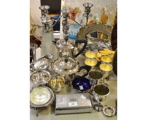 Plated Ware - a three-branch table candelabrum; a tea pot and hot water pot; Walker & Hall basket; silver hafted tea knives; 