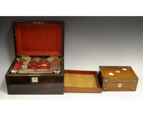 A Victorian lady's dressing box, hinged cover enclosing an fitted arrangement of harlequin EPNS mounted and cut glass dressin