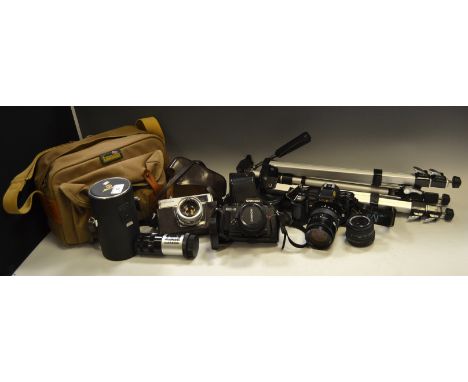 A 'Minolta 7000' camera, case, another 'Chinon CG-5'; various lenses; a stainless steel tripod; etc.