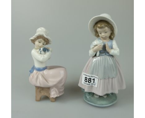 Nao figures of Child holding Bouquet of posies and Young girl holding puppy (2)