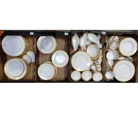 A large collection of Minton jeweled gold (K128) soup, consomme, fish plates, main plates, side plates, coffee cups and sauce