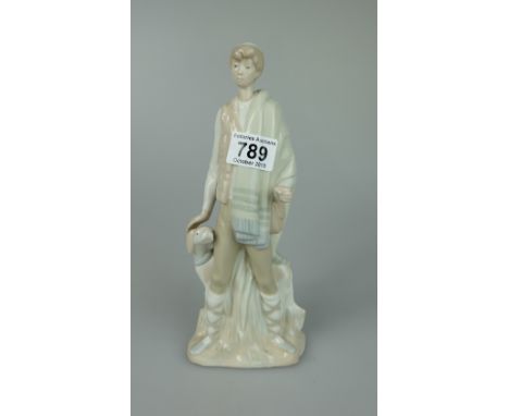 Lladro figure of Shepherd standing with dog at his side height 28cm (missing wooden stick)