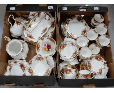 A large collection of R Albert Old Country Rose first quality tea and dinnerware to include dinner plates, cups, saucers, sid