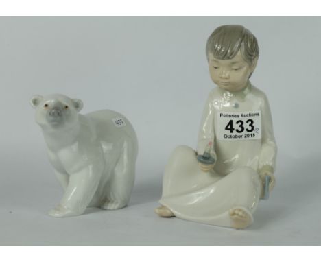 Nao figure of seated boy with candlestick and Lladro figure of a Polar Bear  (2)