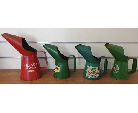 A Thelson Tractor oil pourer, quart, and there pint pourers,  Duckhams, BP and Castrol (4). 