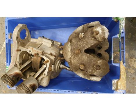 A Norton Dominator 88 partial engine, cases R122 88245, alternator crank with rods and pistons, head and barrels. 