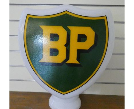 A glass BP petrol globe. 