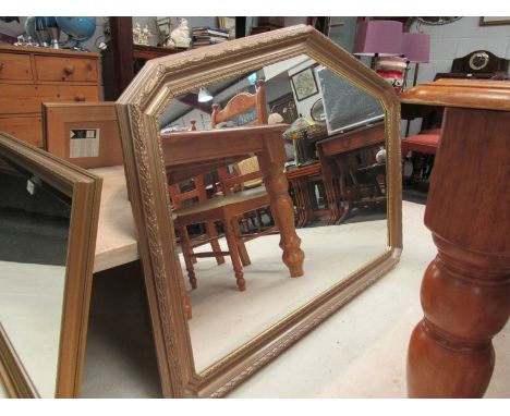 A modern gilt framed leaf design overmantel mirror with arched top, 123cm wide