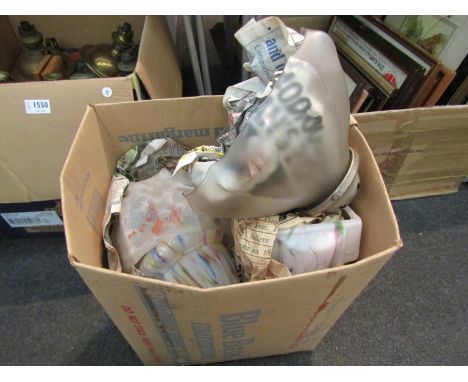 A box containing glass gas lamp shades