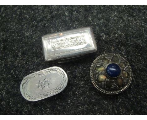 A silver pill box and two silver vinaigrettes 