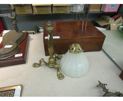 An Edwardian brass three legged lamp base with opaque shade 