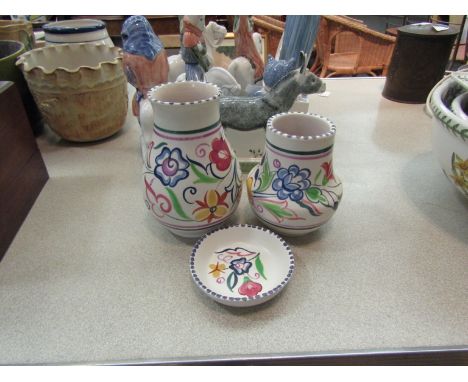 A Poole Pottery bulbous body vase, smaller vase and dish