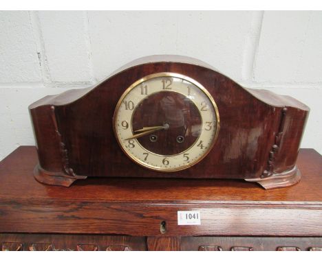 A 1950's oak and walnut striking mantel clock with Arabic chapter ring, German 8-day movement by Carl Werner with countwheel 