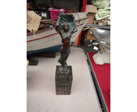 A bronze figure depicting semi-clad maiden with arms aloft, signed "Milo", with J.B. Deposee plaque, 36cm high