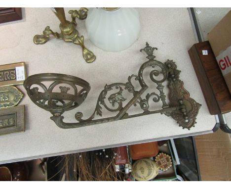 A wrought iron light fitting 