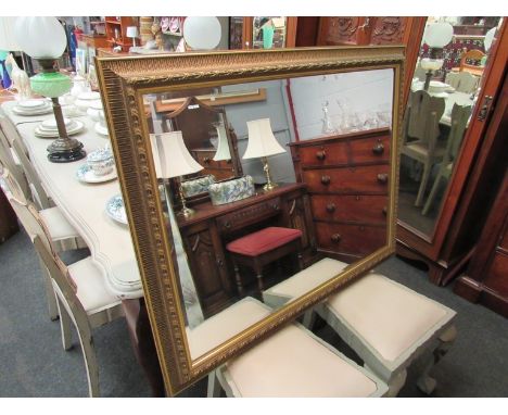 A large gilt framed bevelled mirror with egg and dart border to frame, 90cm x 116cm overall