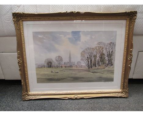 A 20th Century lithograph in a swept gilt frame of Salisbury Cathedral seen across the meadows, after George Sear, signed in 