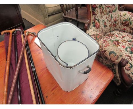 An enamel bread bin and matching jug