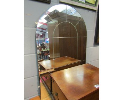 An arch top over mantel mirror, one pane loose, 92cm x 61cm