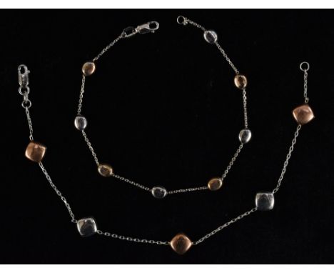 A 9ct rose and white gold five panel fine link bracelet, alternating colour rounded squares, fine link dividers, 17cm long;  