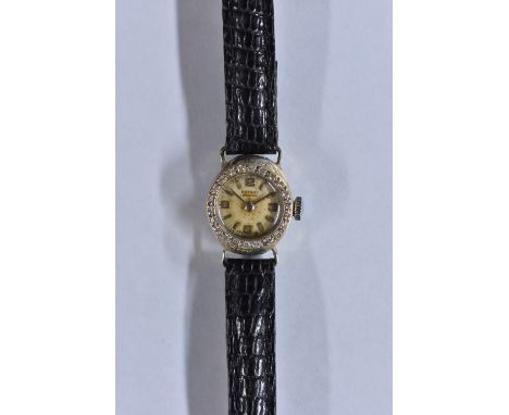 Rotary - a diamond set 9ct gold lady's Maximus wristwatch, silvered dial, Arabic numerals, block batons, manual wind movement