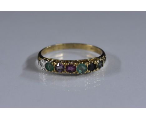 A multi gem seven stone diamond accented regard ring, 9ct gold shank, London 1993, size Q, 1.4g gross 