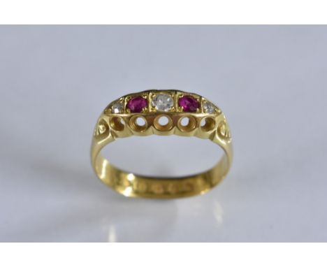 A Victorian diamond and ruby five stone ring, alternate set with three old round brilliant cut diamonds and two red rubies, t