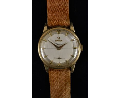 Omega - a vintage 1950s Geneve 9ct gold cased wristwatch, brushed silvered target dial, arrow batons, inner minute track, sub