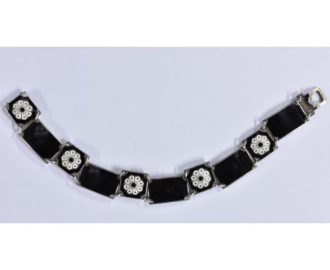 David Andersen - a Norwegian sterling silver and enamel bracelet, alternating panels of black and white floral design, each d