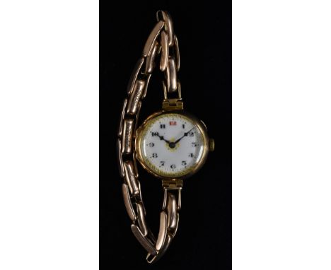 A George V 9ct rose gold lady's bracelet watch, white dial, red and black Arabic numerals, gilt minute track, blued hands, ma