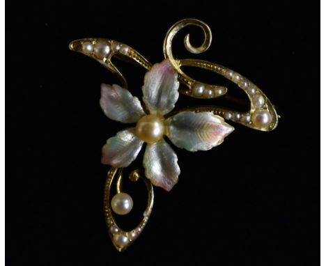 An Edwardian enamel and seed pearl Art Nouveau floral brooch, central five petal multi tone flower with single cultured pearl