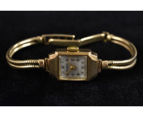 An Audax Art Deco lady's 9ct gold bracelet watch, rectangular dial, Arabic numerals, manual movement, 9ct gold case and doubl