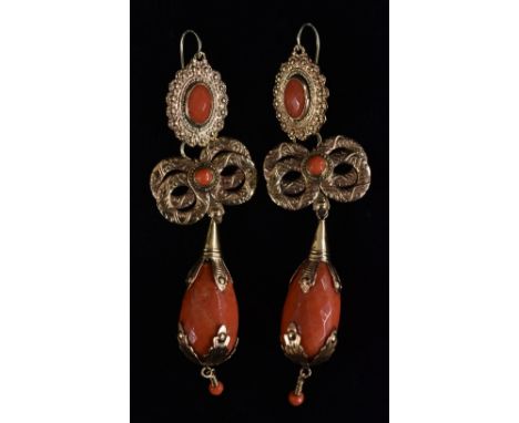 A pair of metamorphic coral and yellow metal retro drop earrings, detachable top oval panel, suspending a double bow arched p