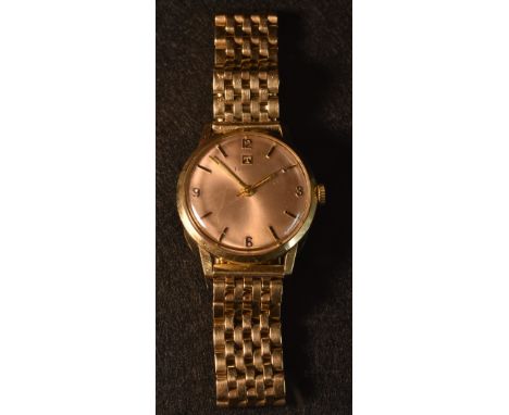 Tissot - A vintage 1960s gentleman's 9ct gold wristwatch, brushed dial, quartered Arabic numerals, rectangular baton markers,