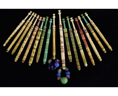 Lace making bobbins, 19th Century and later - a turned bone dot engraved bobbin, named Jane; another similar with glass spang
