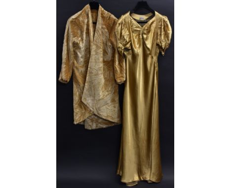 A 1920/30s lady's evening dress, deep gold satin, balloon sleeves, ruched bodice detail, Andoposa Model, England; a crushed v