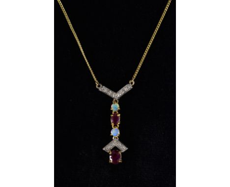 A diamond, opal and ruby  articulated pendant necklace, 9ct white and yellow gold mount and chain, stamped 375, Sheffield 200