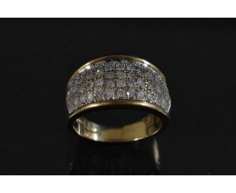 A pave diamond ring, tapering arched panel set with fifty one round cut diamonds, total estimated diamond weight approx 1.0ct