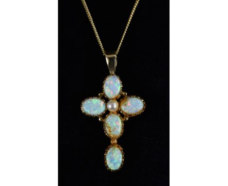 An opal and culture pearl crucifix pendant necklace, central creamy white cultured pearl, within a five panel cross inset wit