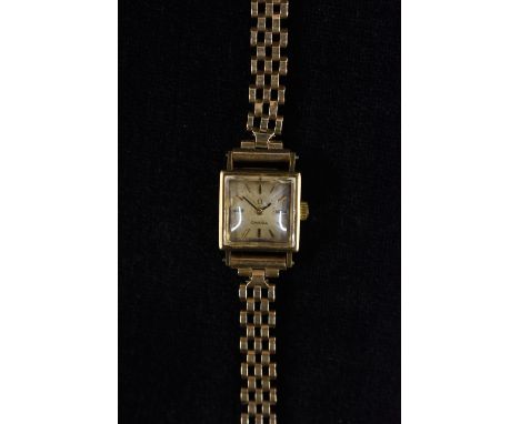 Omega - a vintage 1960s lady's 9ct gold cased bracelet watch, square dial, block baton markers, manual wind cal 650 movement,