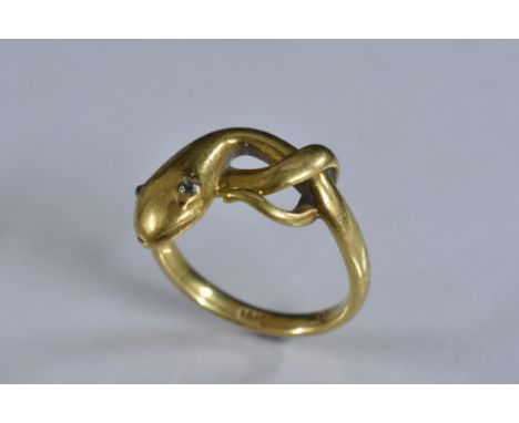 A gentleman's 18ct gold entwined snake signet ring, diamond accent eyes, stamped 18ct, size Q, 8.4g gross, boxed