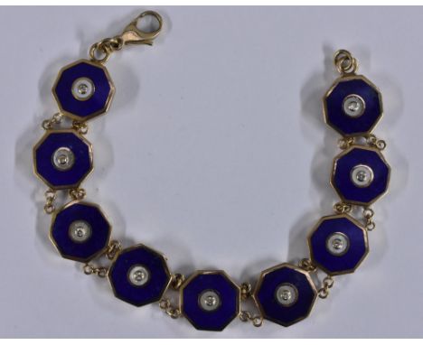 An enamel and diamond octagonal shield panel bracelet, each b;ue enamelled octagonal panel central set with a single round br