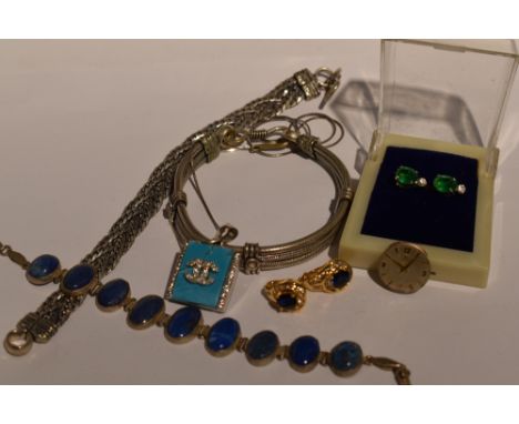 A small selection of white metal jewellery including Lapis lazuli set articulated bracelet, woven bracelet, pendant with Chan