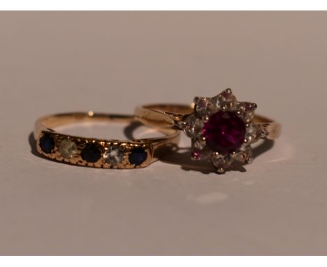 A lady's half eternity ring having three sapphires interspersed by cubic zirconia on a 9ct gold loop, and a paste cluster on 