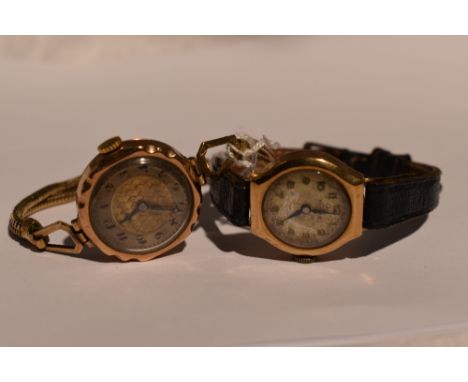 Two lady's vintage 9ct gold wrist watches having Arabic numeral dials with rolled gold and leather straps